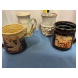 Assorted stoneware mugs