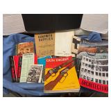 Assorted gun books and gun cleaning kits