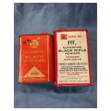 Two partial Black powder cans