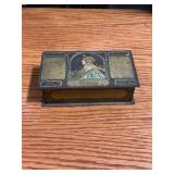 Whitmans metal box with assorted sewing supplies