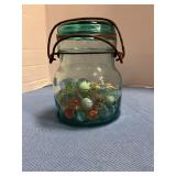 Blue Atlas jar with marbles