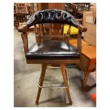 Swiveling barstool with leather seat