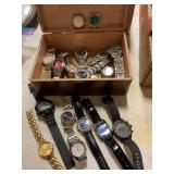 Assorted watches in cigar box