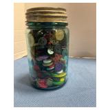 Mason jar of buttons pint size