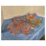 Assorted colored glass cups and bowl