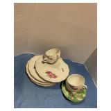 Set of 4 Tea cups and 5 saucers
