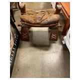Antique saddle chair