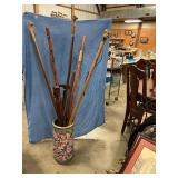 Umbrella stand with misc canes/walking sticks