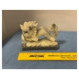 Carved stone dragon figurine
