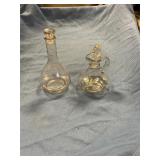 Two small glass pitchers