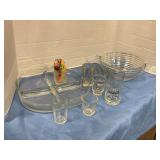 Assorted shot glasses and glass dishes