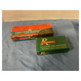 Sharpening stone & Remington .25 Auto shells
