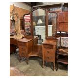 Antique wooden vanity with winged mirror