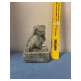 Carved stone guardian lion figurine