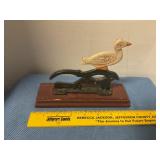 Cast iron duck nutcracker on wood base