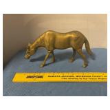 Vintage brass grazing horse figure
