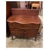 Antique wooden dresser on wheels