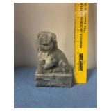 Carved stone guardian lion figurine