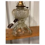 Glass plug in oil lamp