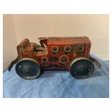Vintage tin wind-up tractor