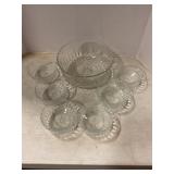 6 small glass bowls and one large glass bowl