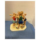 Vintage porcelain figurine titled "oh yeah!"
