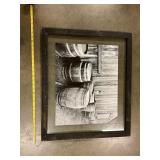 Framed rustic picture of wooden barrels