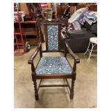 Upholstered dining chair with arms