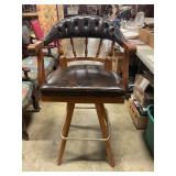 Swiveling leather/wood barstool