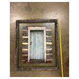 Framed picture of rustic door