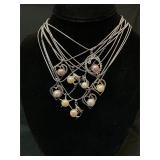 9 assorted costume necklaces
