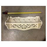 Wall coat rack w/loose pegs
