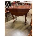 28' round drop leaf side table 25' tall