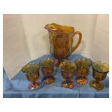 Vintage carnival glass pitcher w/5 wine glasses
