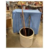 17' tall ceramic pot 15' round w/3 walking sticks