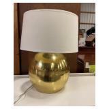 Large Gold toned lamp w/ dent see pics
