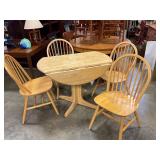 Round oak table with drop leaves