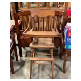Vintage wooden high chair w/cane seat