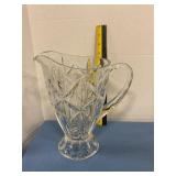 Crystal pitcher with shooting star pattern