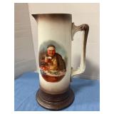 Antique monk pottery pitcher