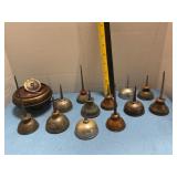 Vintage miniature thumb-pump oil cans