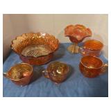 Carnival glass bowl and cups
