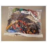 BAG OF ASSORTED COSTUME JEWELRY