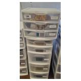 STACK OF STORAGE BINS, FABRIC SAMPLES