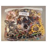 BAG OF ASSORTED COSTUME JEWELRY