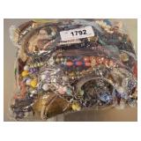BAG OF ASSORTED COSTUME JEWELRY