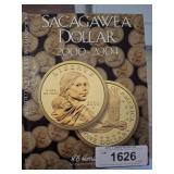 PARTIAL SACAGAWEA COINS 3 PC IN COLLECTORS ALBUM