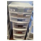 STACK OF STORAGE BINS, FABRIC SAMPLES