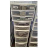 STACK OF STORAGE BINS, FABRIC SAMPLES