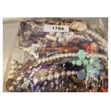 BAG OF ASSORTED COSTUME JEWELRY